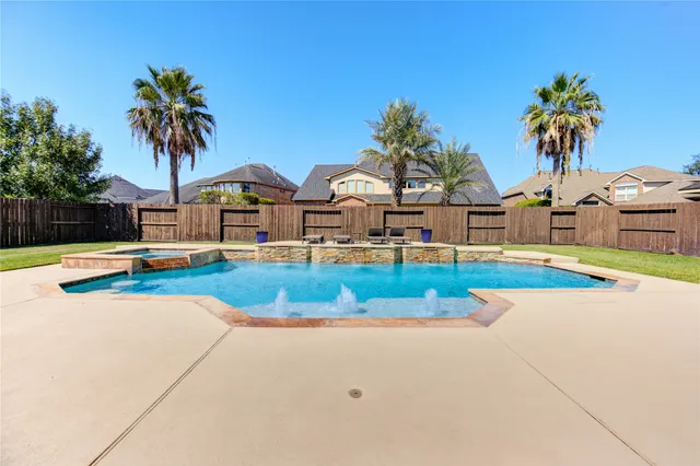 a view of outdoor space yard and swimming pool