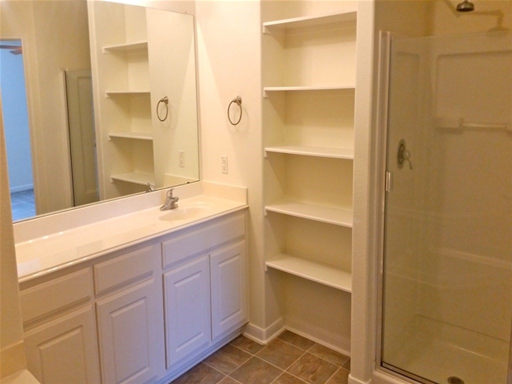 4345 Medina River Loop Spring, TX 77386 - Photo 10 of 14 a bathroom with a double vanity sink and a mirror