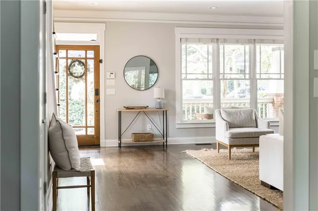 a kitchen with granite countertop a sink stainless steel appliances and cabinets