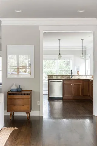 a view of a dining room with furniture window and outside view