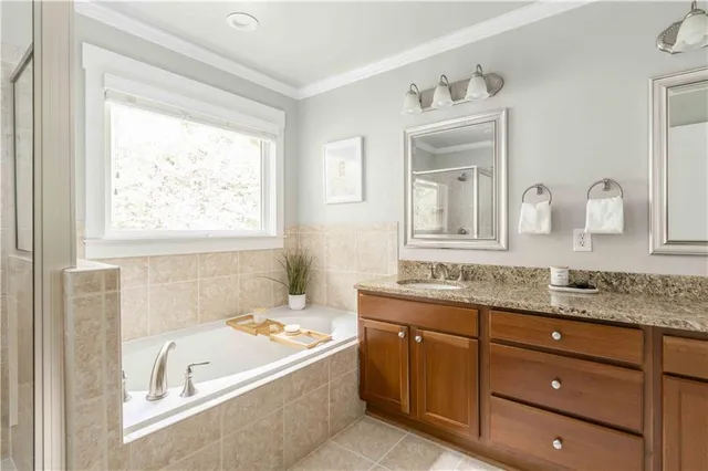 a wooden bench sitting in front of a window