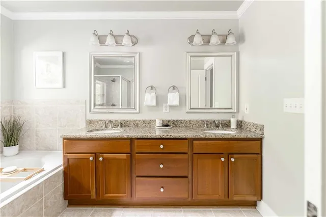 a view of a two chairs in the balcony