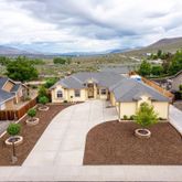 an aerial view of a house with a garden