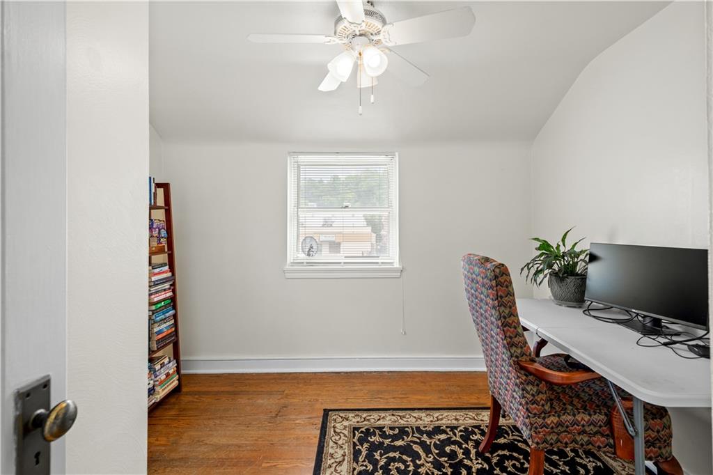 370 Vanadium Road Pittsburgh, PA 15243 - Photo 16 of 24 a view of a workspace with furniture and a window