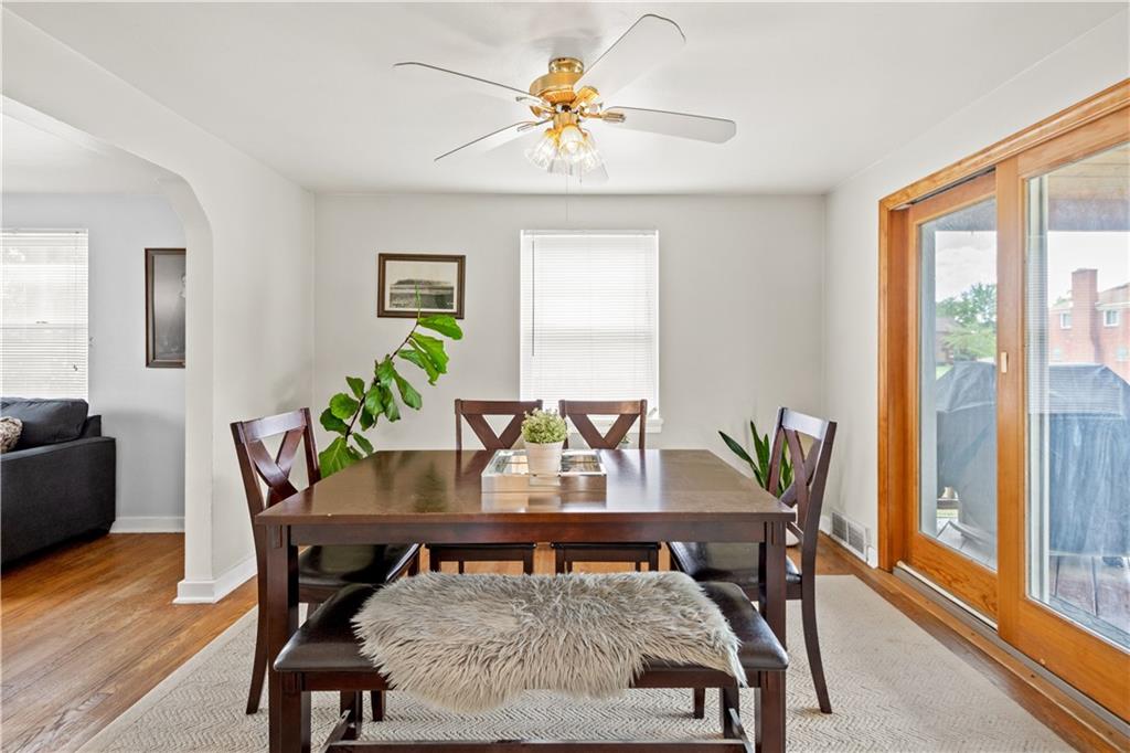 370 Vanadium Road Pittsburgh, PA 15243 - Photo 9 of 24 a view of a dining room with furniture window and wooden floor