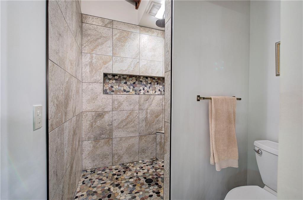 12 Tamarack Point Jasper, GA 30143 - Photo 38 of 83 a bathroom with a toilet and a shower