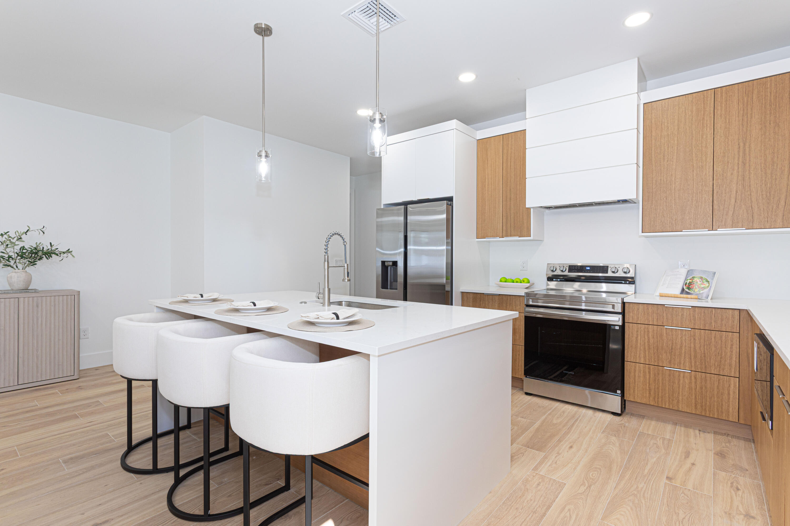 314 4th Street Jupiter, FL 33458 - Photo 21 of 55 a kitchen with a sink and stove