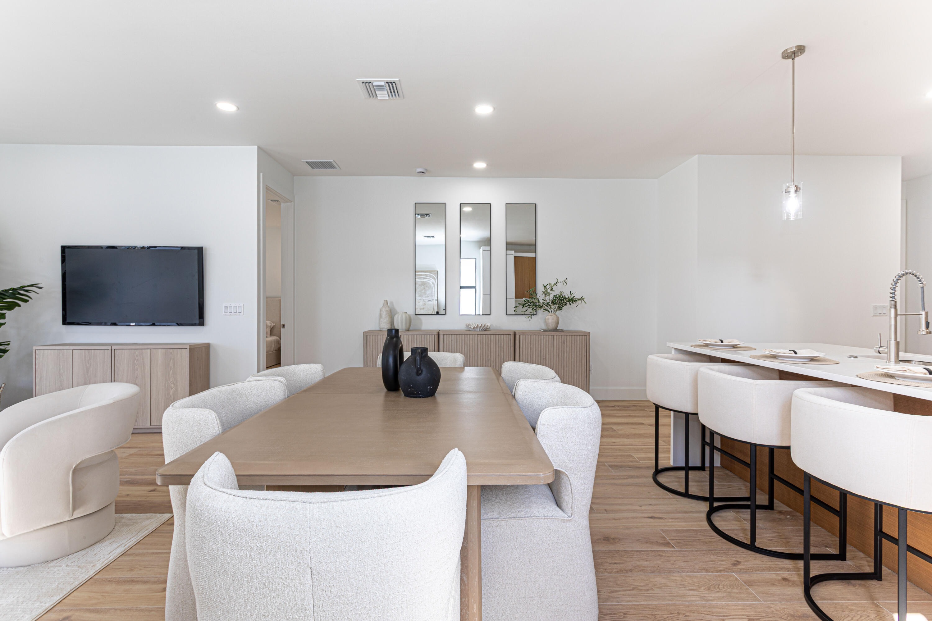 314 4th Street Jupiter, FL 33458 - Photo 22 of 55 a dining room with furniture and a flat screen tv