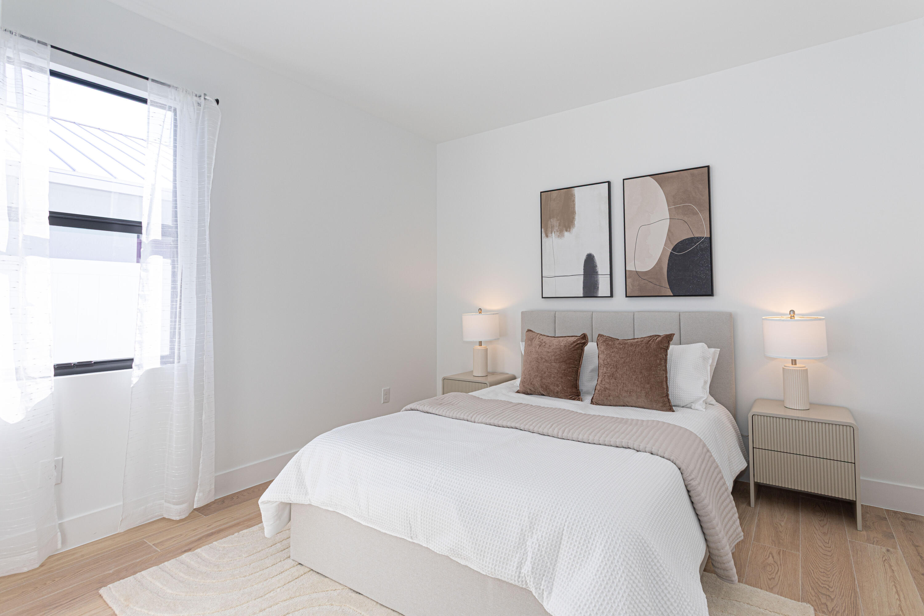 314 4th Street Jupiter, FL 33458 - Photo 34 of 55 a bedroom with a bed and a night stand