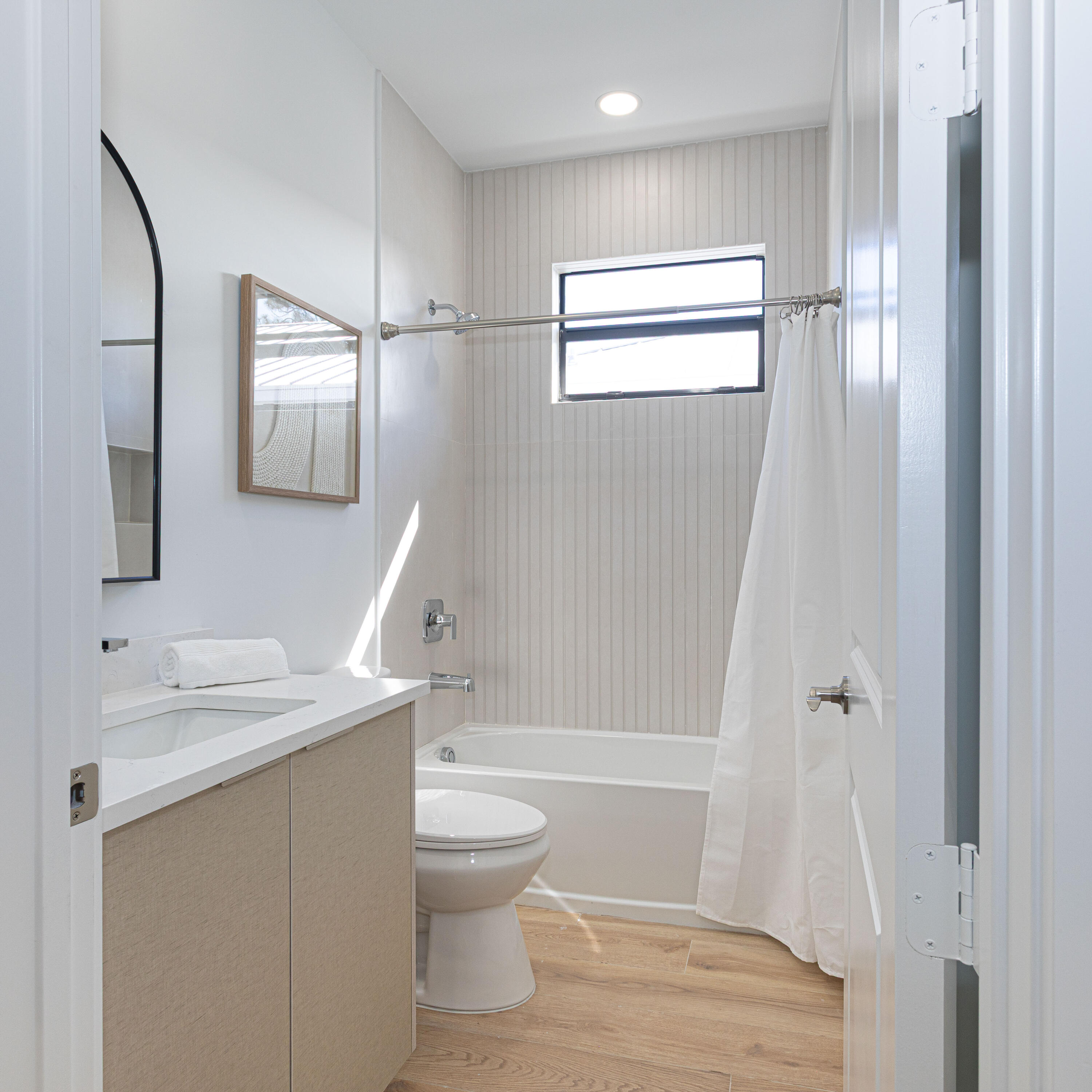 314 4th Street Jupiter, FL 33458 - Photo 35 of 55 a bathroom with a sink a toilet and shower