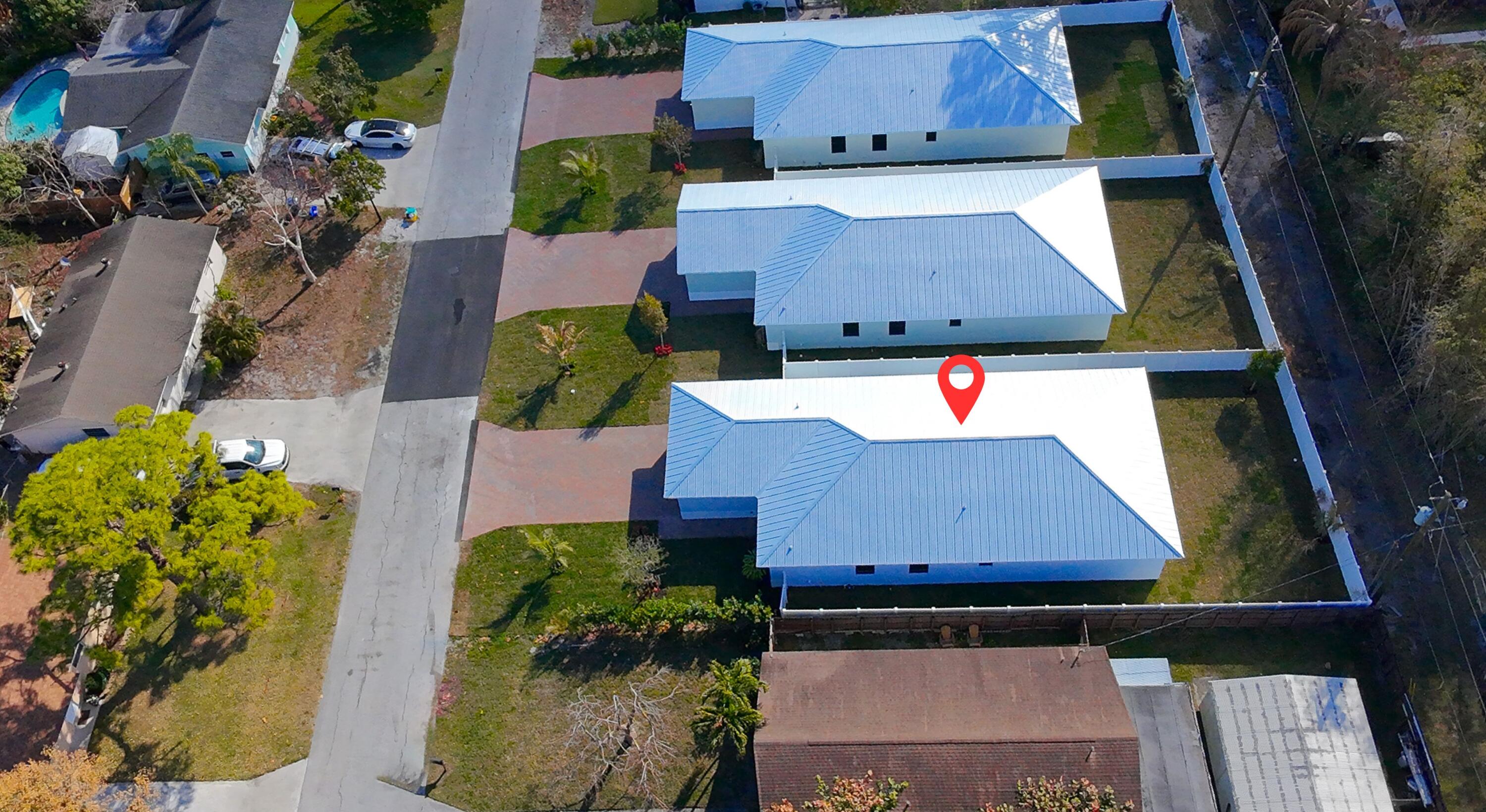 314 4th Street Jupiter, FL 33458 - Photo 53 of 55 an aerial view of residential houses with yard
