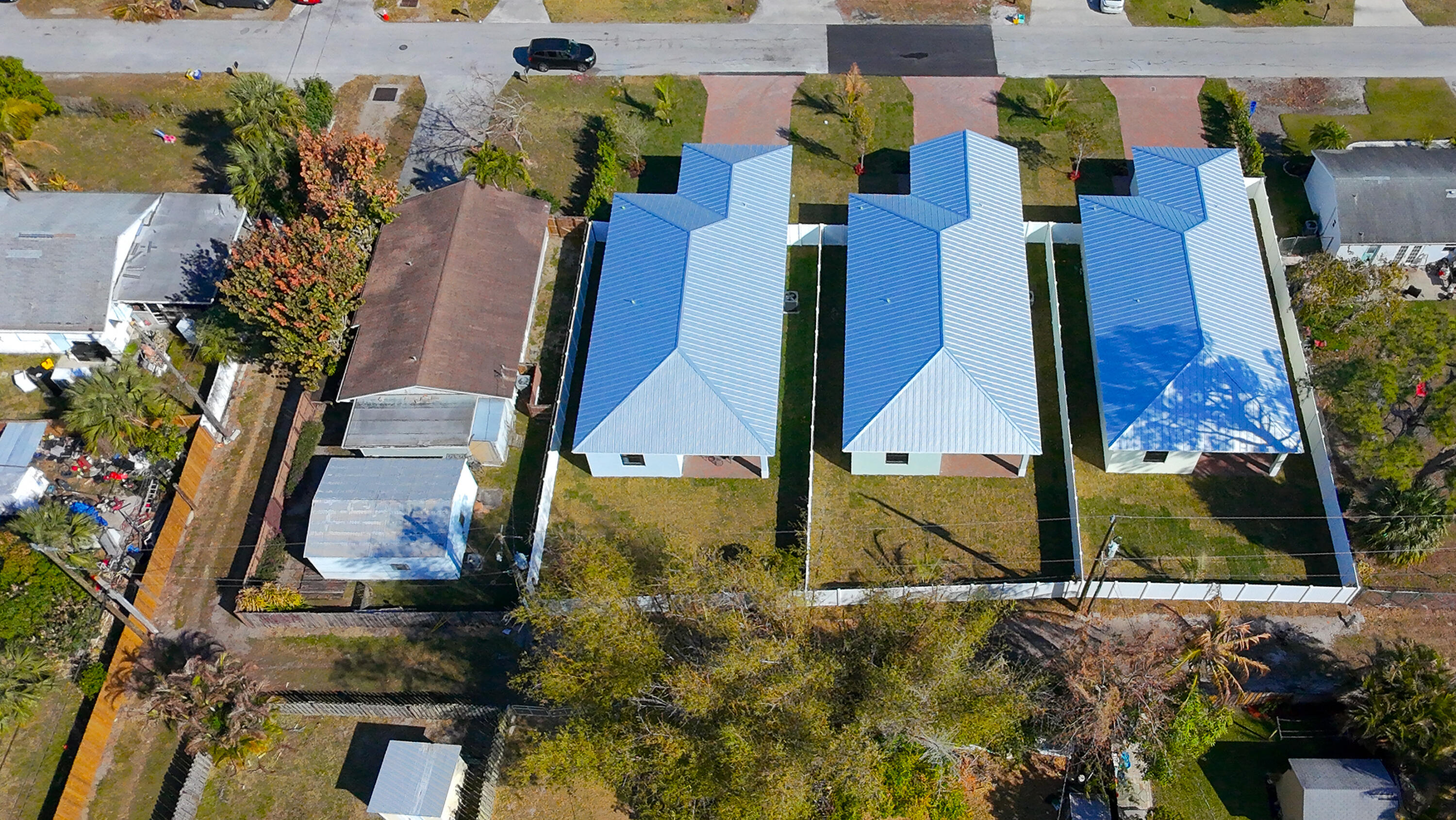314 4th Street Jupiter, FL 33458 - Photo 55 of 55 an aerial view of residential houses with outdoor space