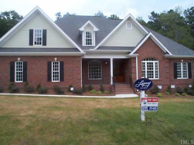 4200 Cypress Ridge Court Raleigh, NC 27616 - Photo 1 of 10 a front view of a house with a yard
