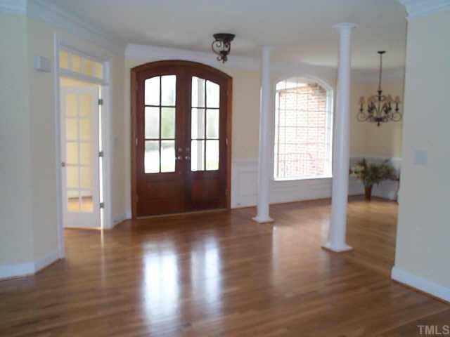 4200 Cypress Ridge Court Raleigh, NC 27616 - Photo 5 of 10 wooden floor in an empty room with a window
