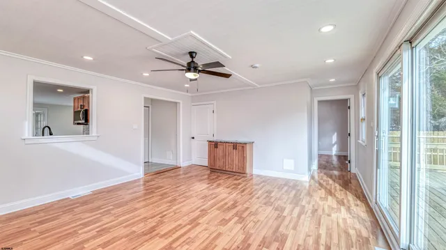 a view of an empty room and window