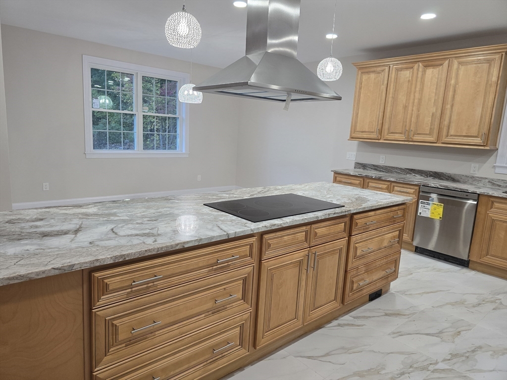 73 Dudley Hill Road Dudley, MA 01571 - Photo 12 of 33 a kitchen with granite countertop cabinets stainless steel appliances a sink and a window