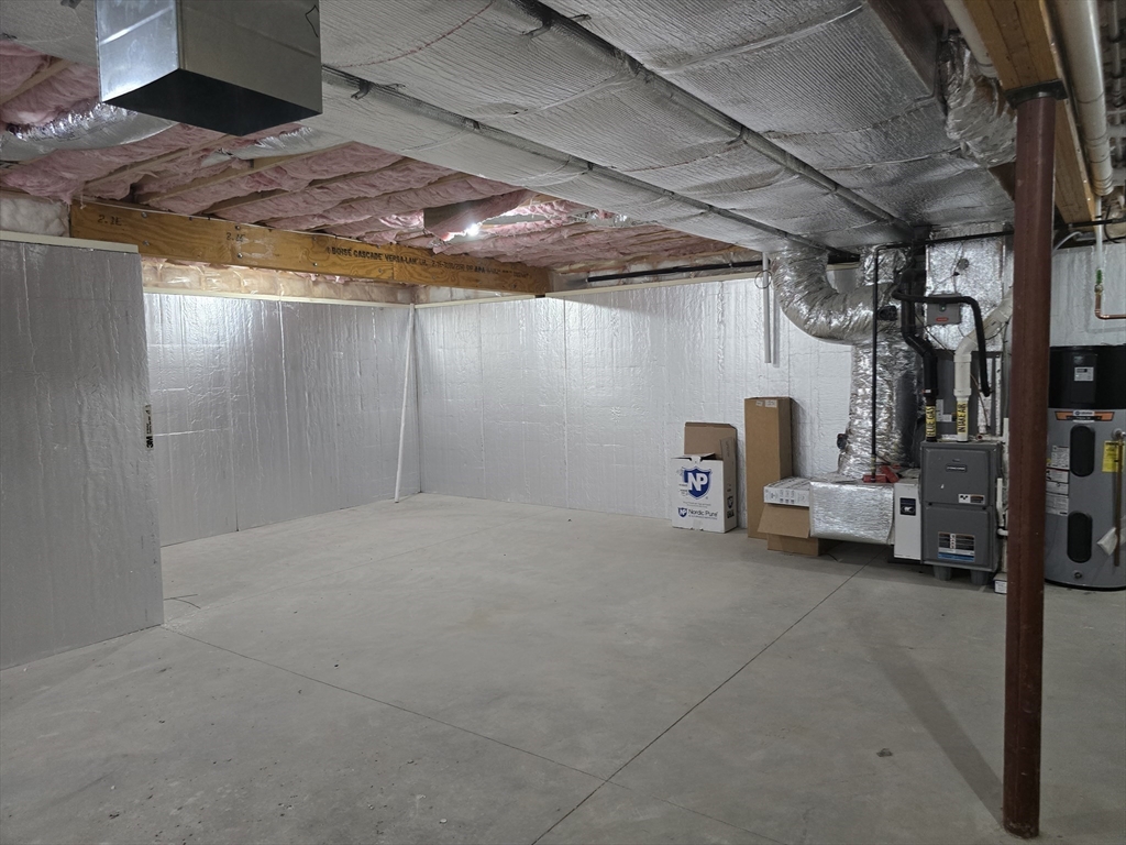 73 Dudley Hill Road Dudley, MA 01571 - Photo 32 of 33 a view of empty room with wooden floor