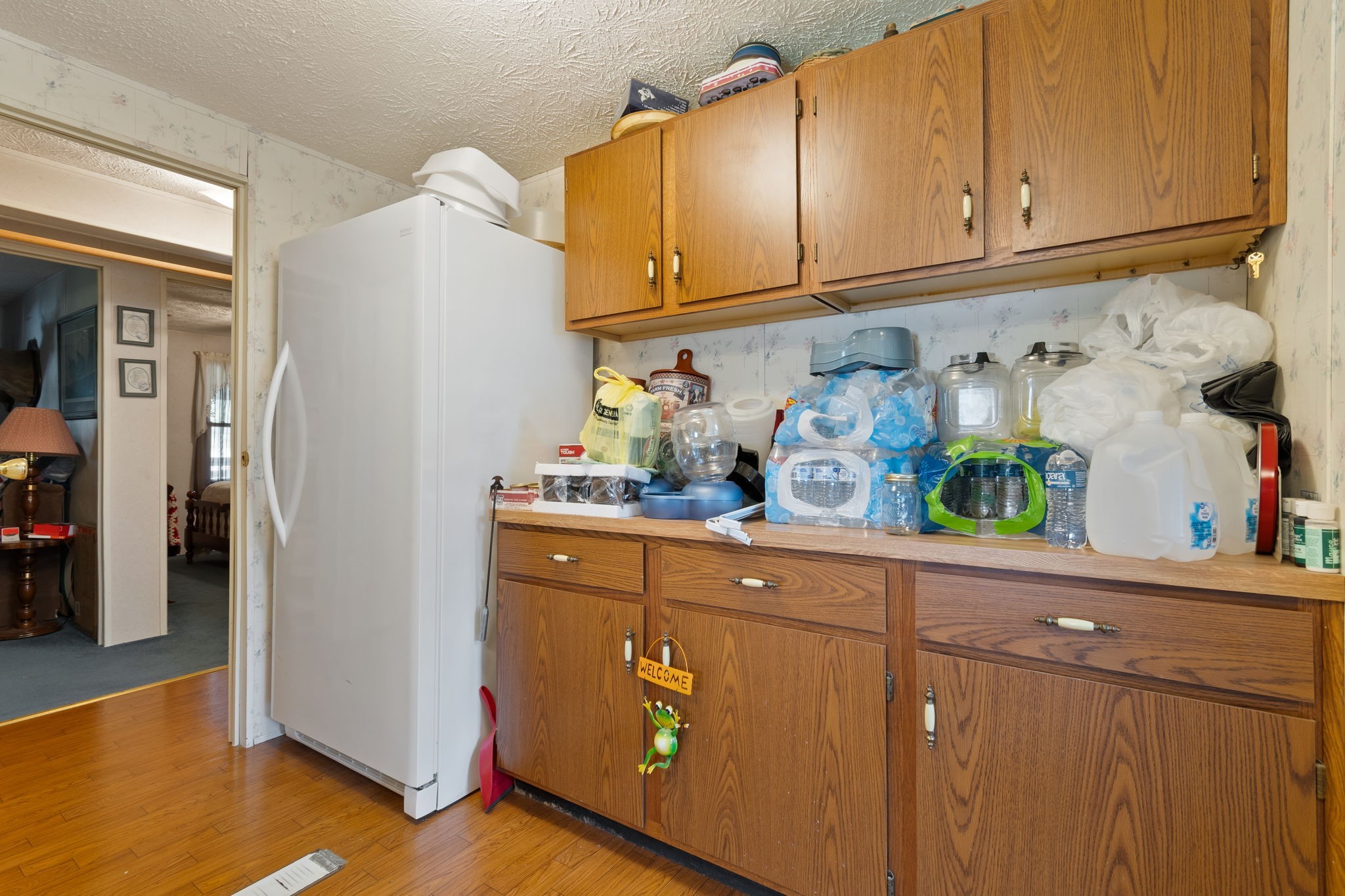 1300 New She Boss Road Duck River, TN 38454 - Photo 11 of 56 a kitchen with stainless steel appliances granite countertop a refrigerator and a sink