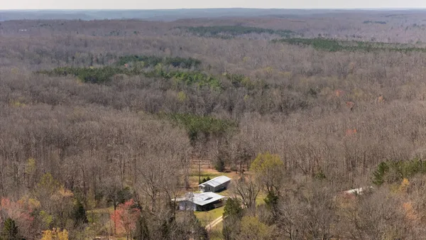 a view of a lake with a yard