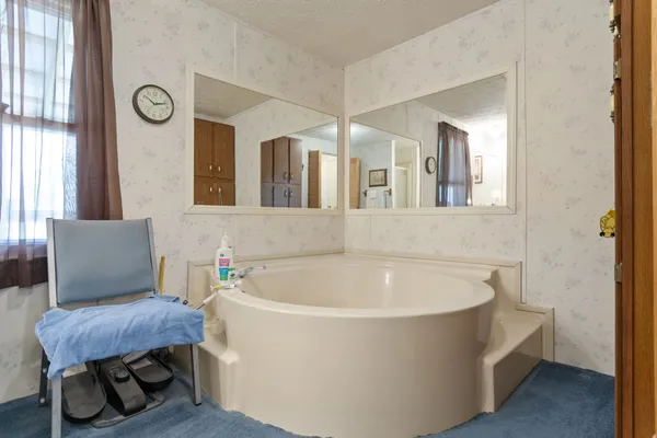 a bathroom with sink and mirror