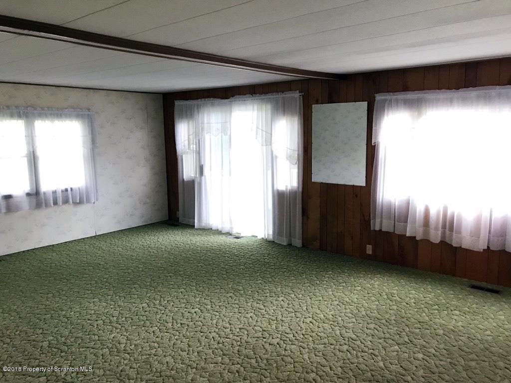 907 Pratt Hollow Road Nicholson, PA 18446 - Photo 11 of 33 a view of an empty room with a window