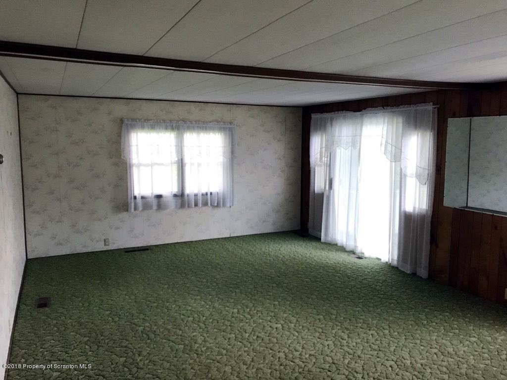 907 Pratt Hollow Road Nicholson, PA 18446 - Photo 12 of 33 a view of empty room with window