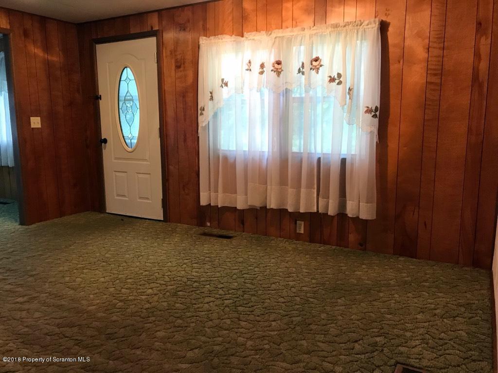 907 Pratt Hollow Road Nicholson, PA 18446 - Photo 14 of 33 a view of wooden floor with windows