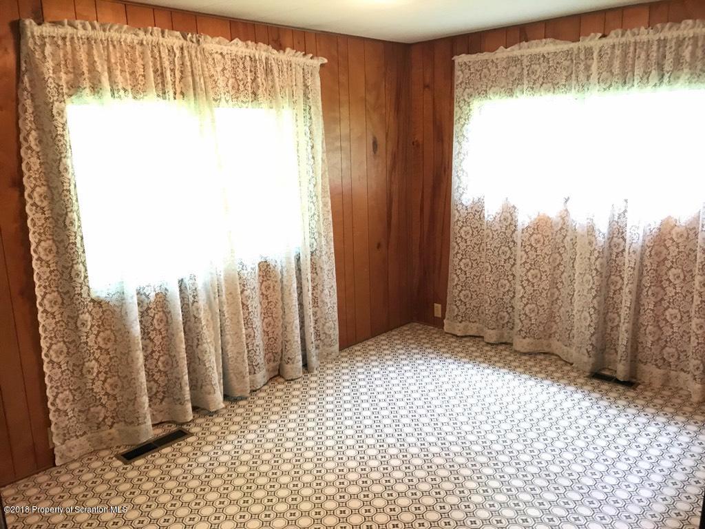 907 Pratt Hollow Road Nicholson, PA 18446 - Photo 18 of 33 a view of a large window with a yard