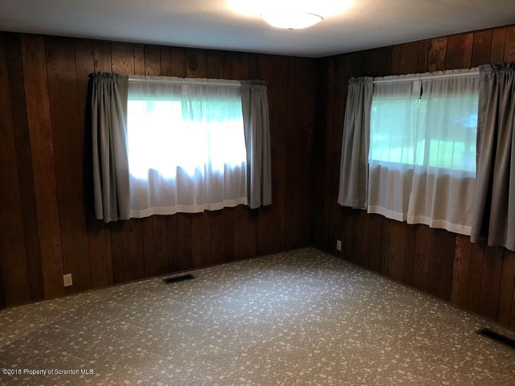 907 Pratt Hollow Road Nicholson, PA 18446 - Photo 20 of 33 a view of an empty room with a window