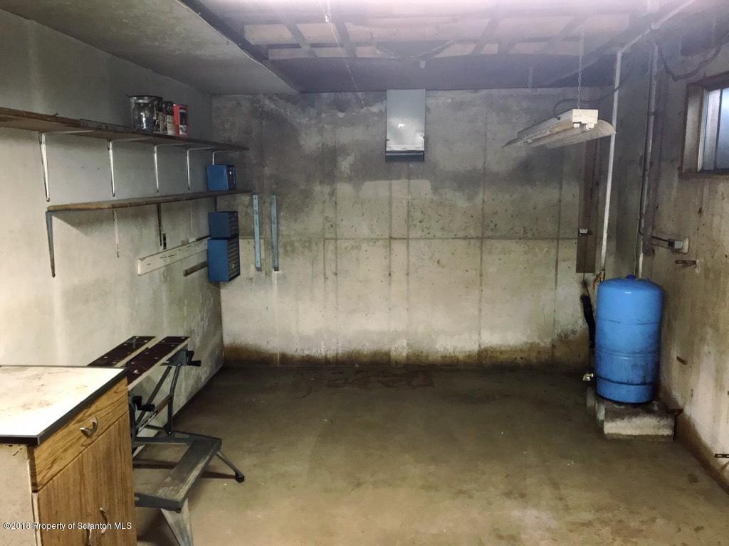 907 Pratt Hollow Road Nicholson, PA 18446 - Photo 29 of 33 an empty room with a space