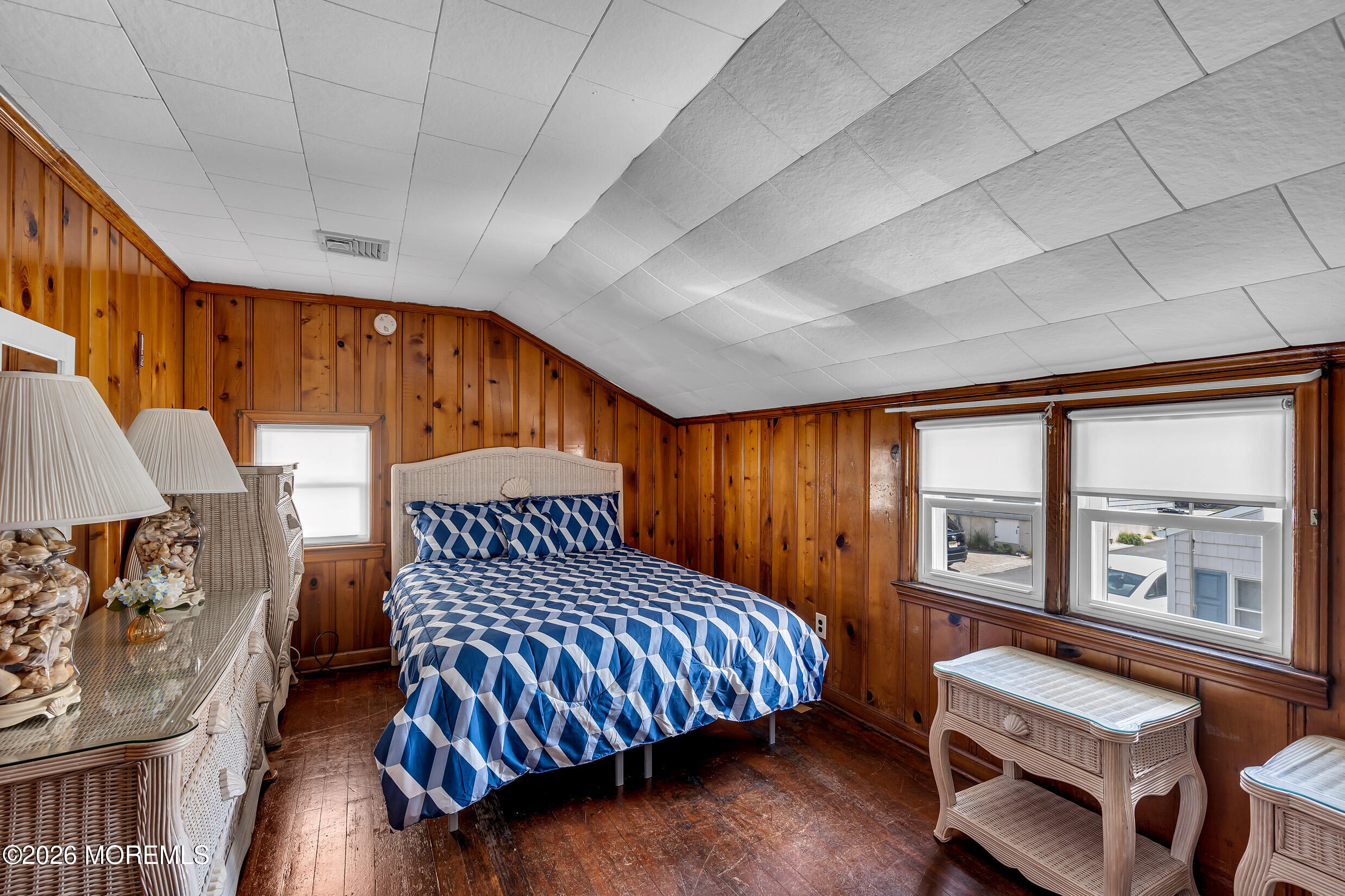 21 East Bay Way Lavallette, NJ 08735 - Photo 14 of 23 a bedroom with a bed and wooden floor