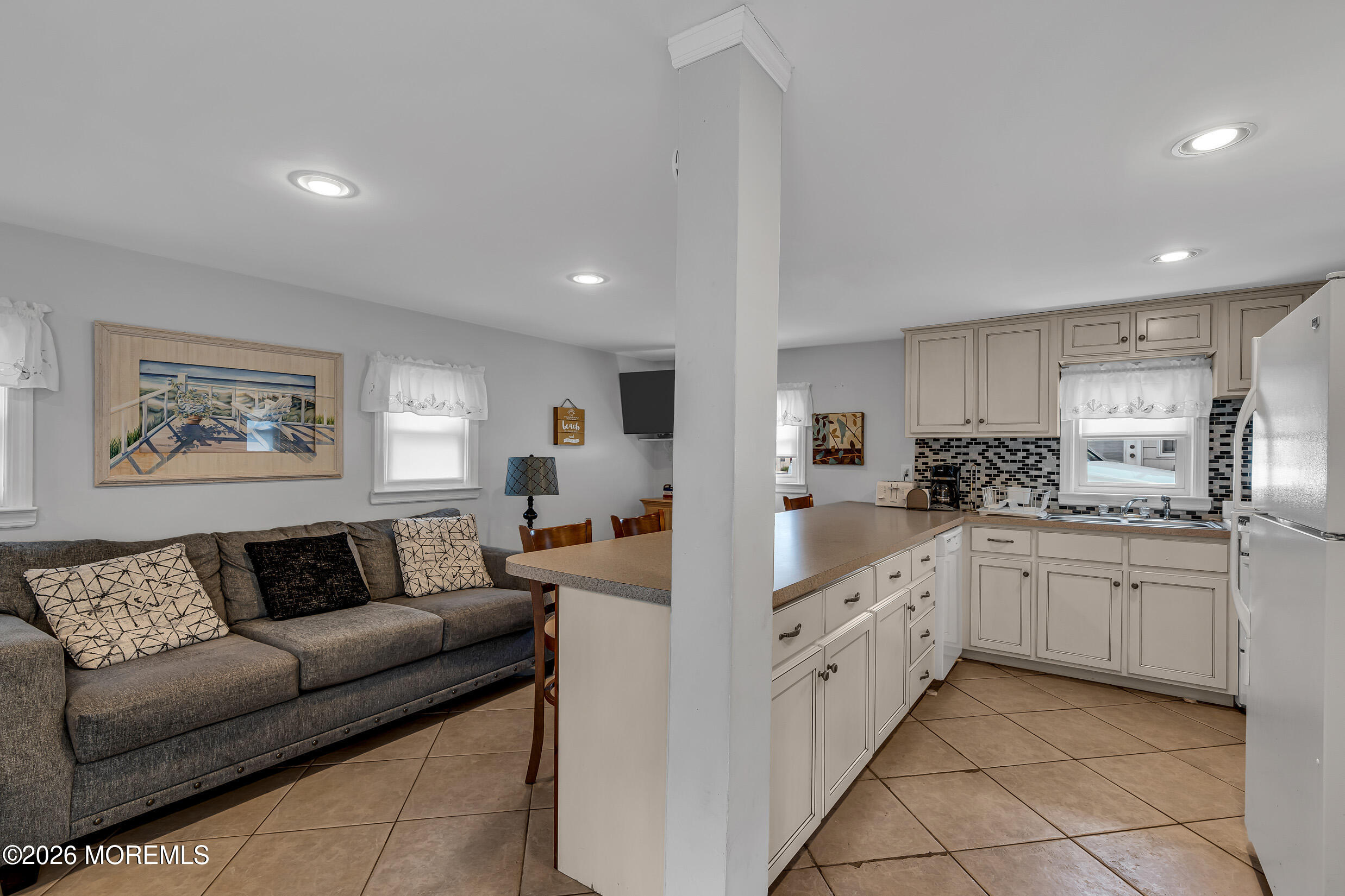 21 East Bay Way Lavallette, NJ 08735 - Photo 17 of 23 a living room with granite countertop furniture and kitchen view