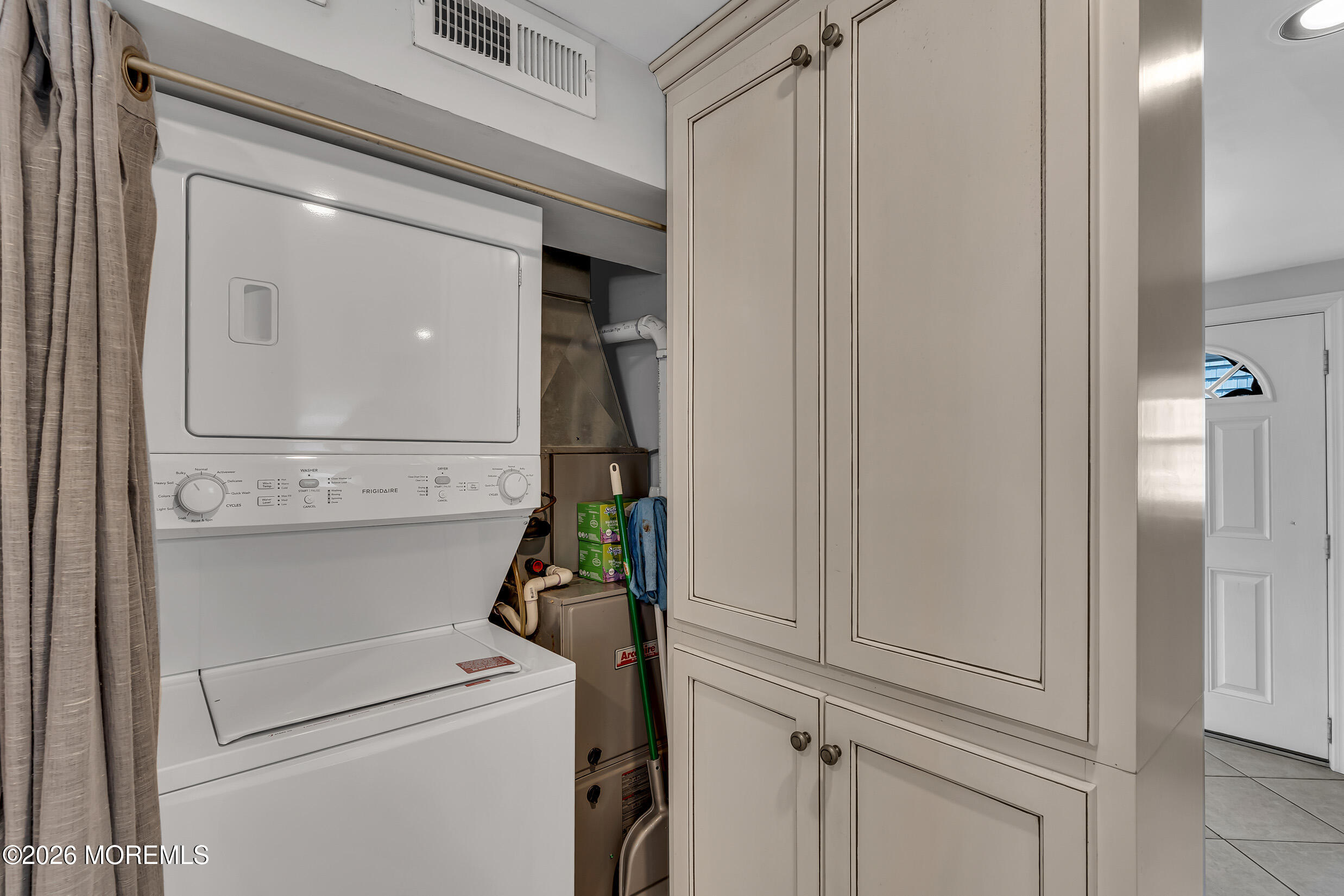 21 East Bay Way Lavallette, NJ 08735 - Photo 9 of 23 a view of storage and utility room with washer and dryer