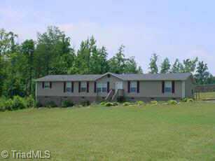 6729 High Rock Road Browns Summit, NC 27214 - Photo 1 of 1 Exterior Front.