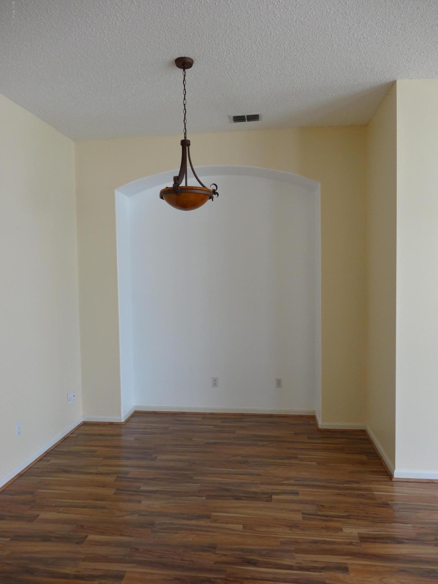 612 Morning Mist Way Orange Park, FL 32073 - Photo 8 of 12 a view of a room with wooden floor