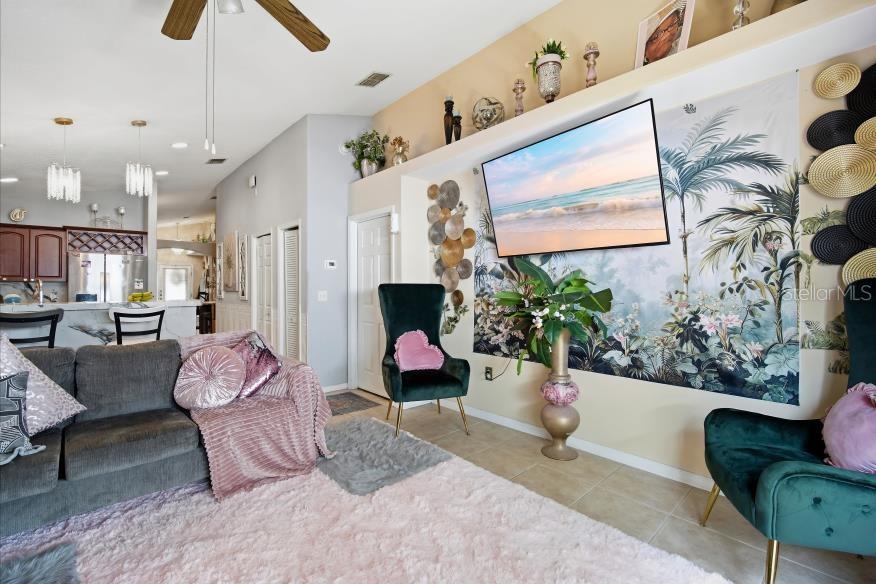 3005 West Chestnut Street Tampa, FL 33607 - Photo 14 of 27 a living room with furniture and a potted plant
