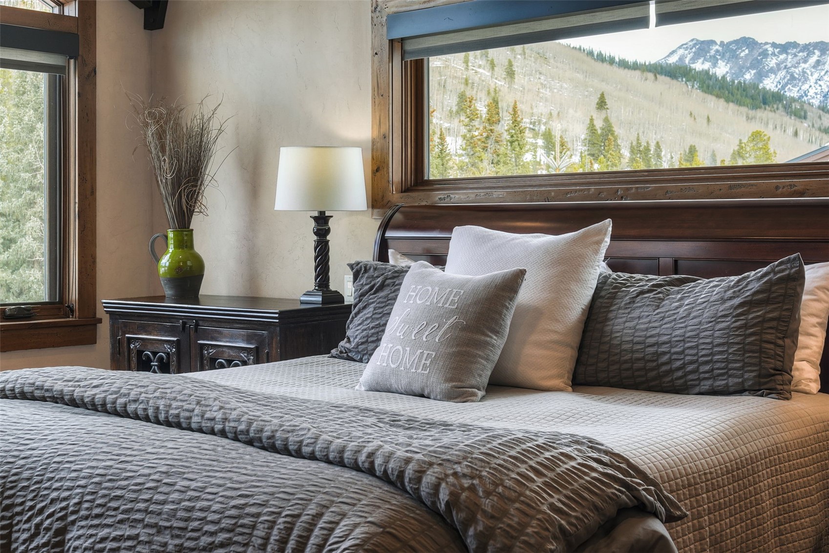 560 Beeler Place Frisco, CO 80443 - Photo 18 of 40 a bedroom with a bed and a window