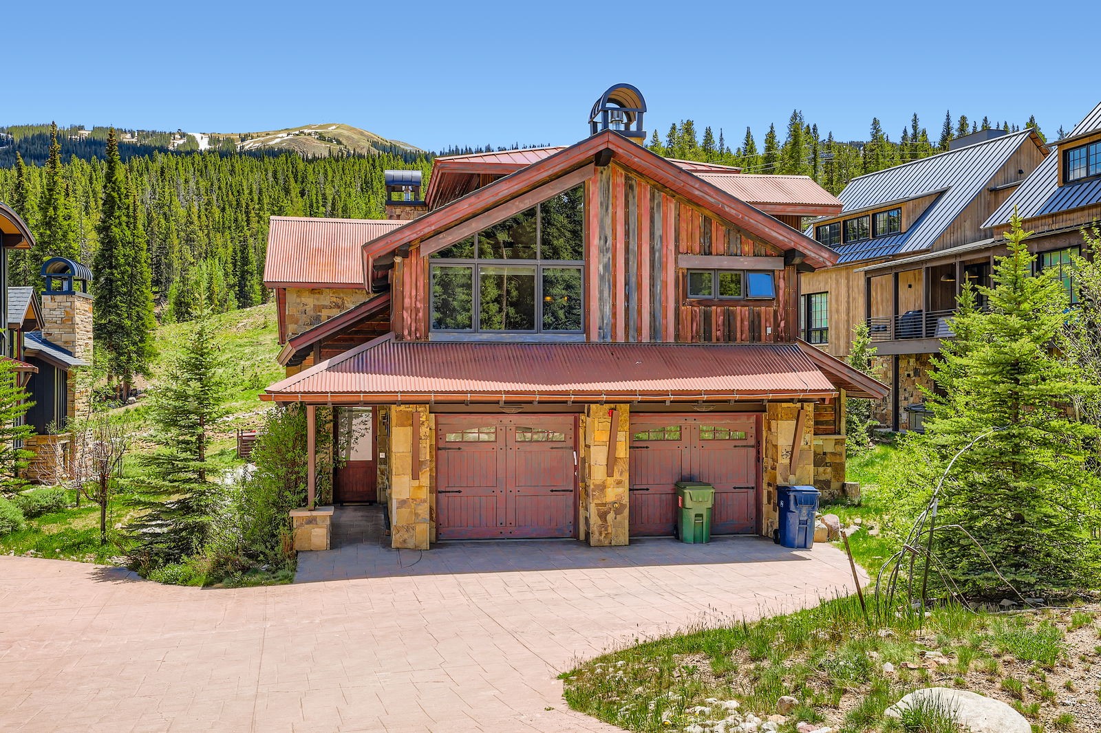 560 Beeler Place Frisco, CO 80443 - Photo 38 of 40 a front view of a house with a yard