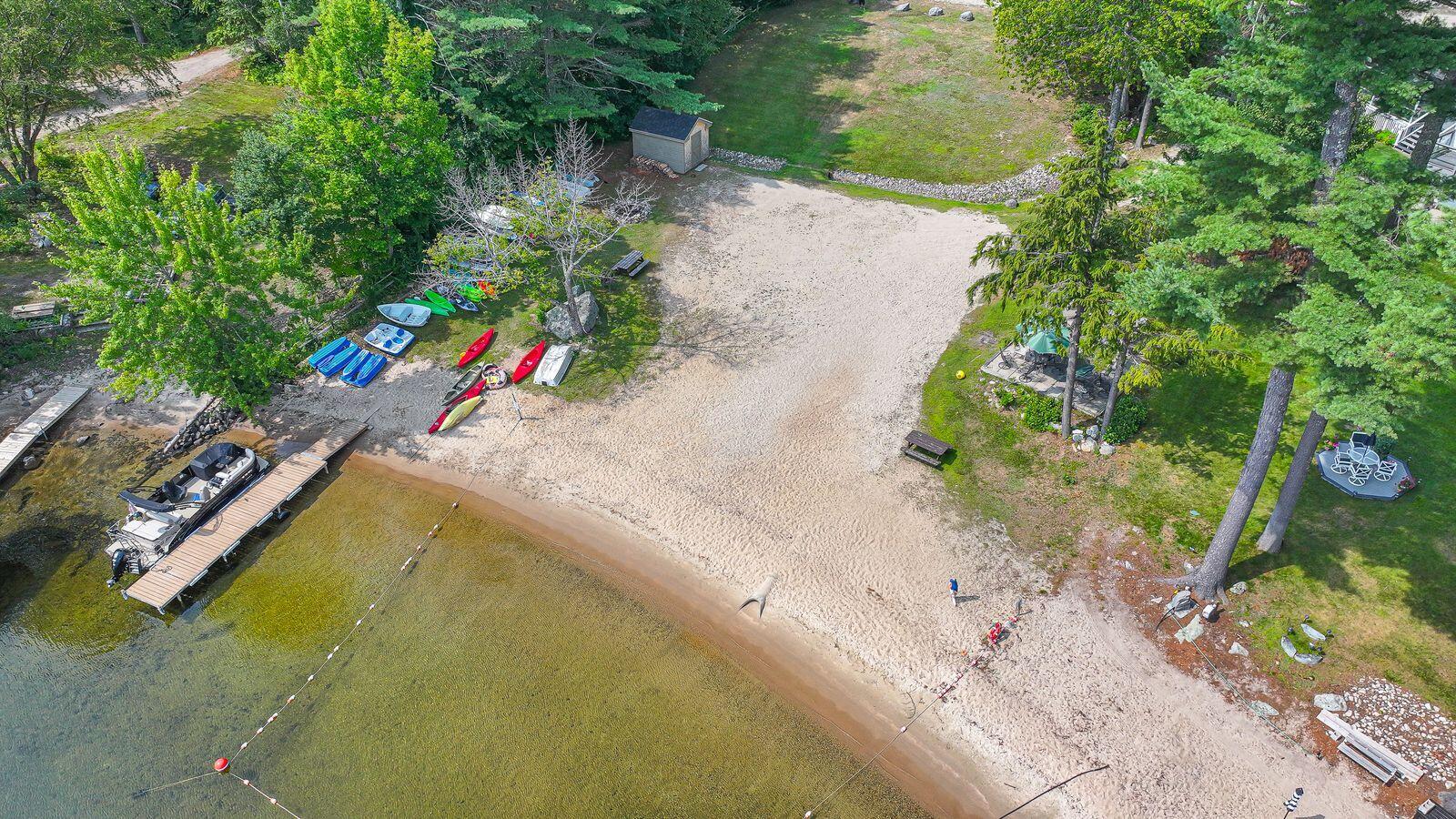 461 Anderson Road Sebago, ME 04029 - Photo 12 of 36 overhead view of beach and shared dock