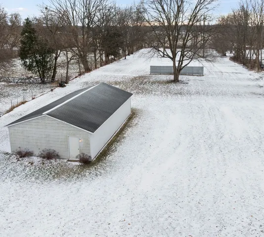 a view of a studio with wooden ceiling