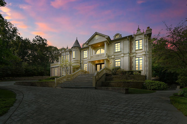 9600 Pacific Court Burr Ridge, IL 60527 - Photo 1 of 58 a front view of a house with a yard