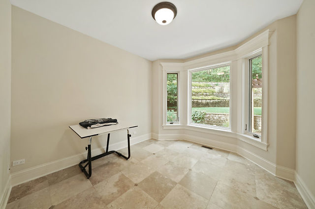9600 Pacific Court Burr Ridge, IL 60527 - Photo 18 of 58 a view of a room with furniture and a window
