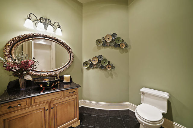 9600 Pacific Court Burr Ridge, IL 60527 - Photo 27 of 58 a bathroom with a toilet and a sink