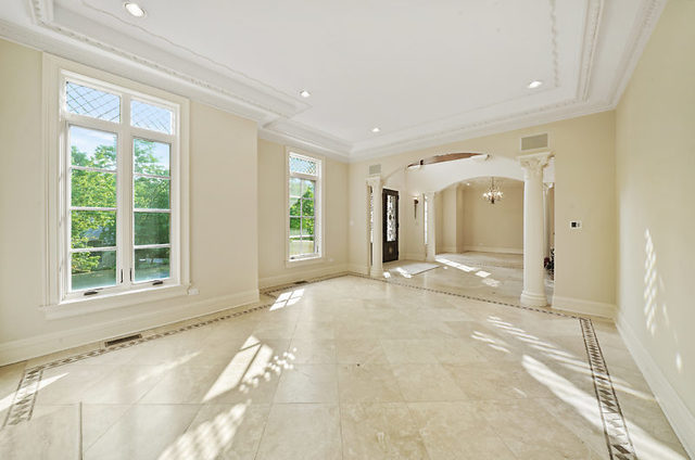 9600 Pacific Court Burr Ridge, IL 60527 - Photo 4 of 58 a view of an empty room with a window