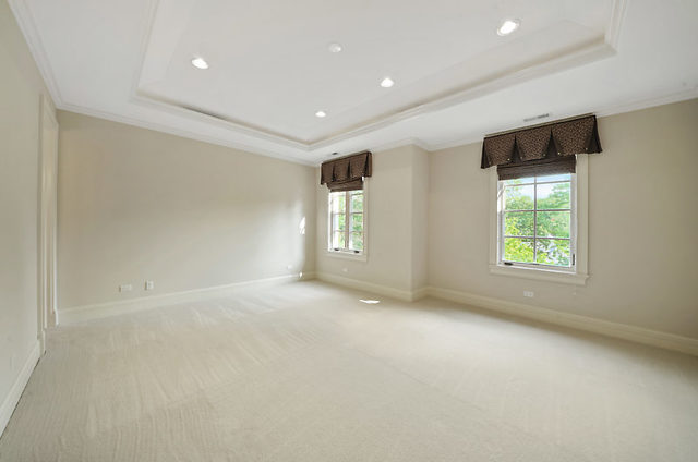 9600 Pacific Court Burr Ridge, IL 60527 - Photo 44 of 58 an empty room with windows