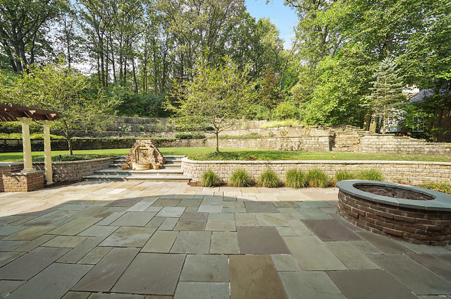 9600 Pacific Court Burr Ridge, IL 60527 - Photo 47 of 58 a view of a swimming pool with a lounge chair