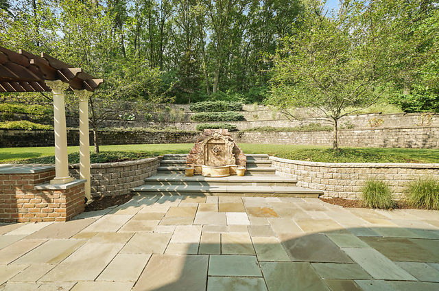 9600 Pacific Court Burr Ridge, IL 60527 - Photo 48 of 58 a view of swimming pool with outdoor seating and plants