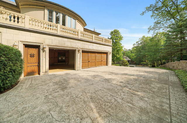9600 Pacific Court Burr Ridge, IL 60527 - Photo 54 of 58 a view of a white building with a large windows