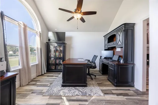 a bedroom with a bed and a view of bedroom