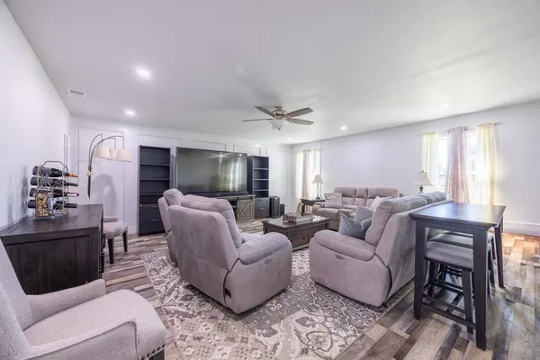 a bedroom with a bed and a view of bedroom